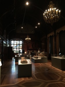 View of the upstairs exhibition space with painted coffins. Two Temple Place. Own photo.